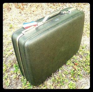 american tourister green suitcase